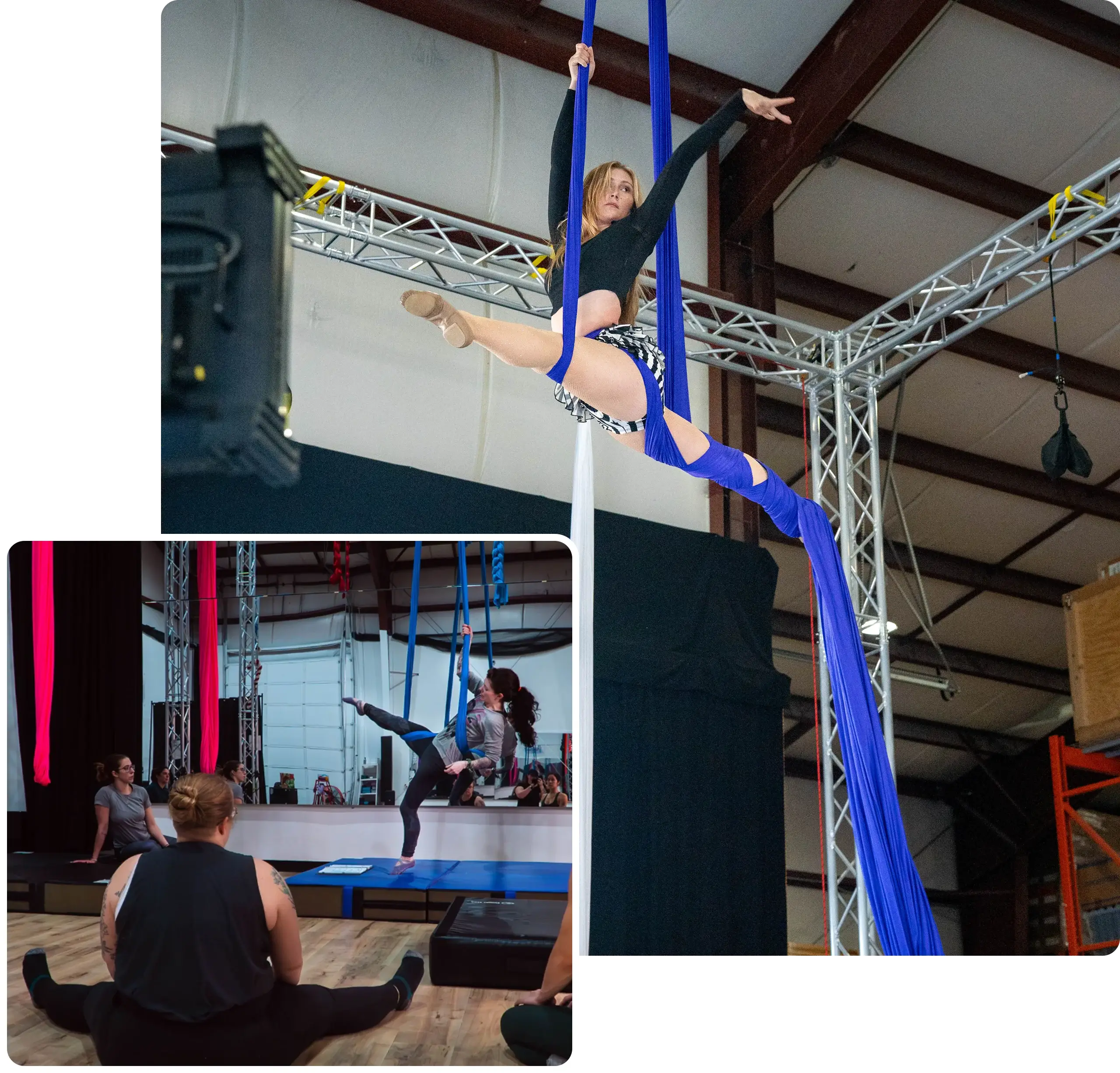 Aerialist performing on blue silks, with students stretching in class below