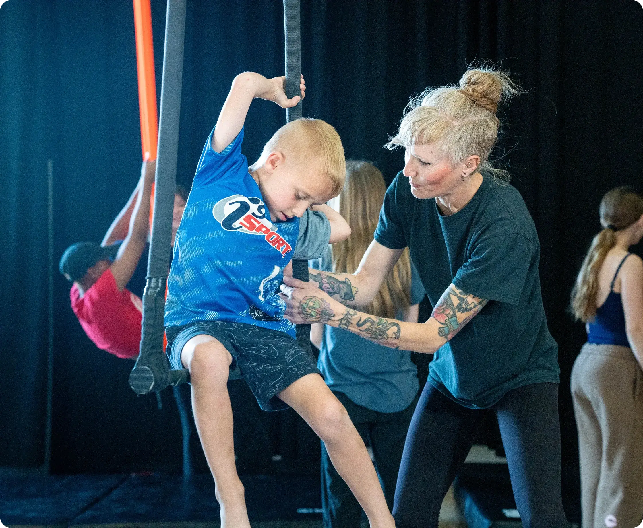 Instructor coaching a young student