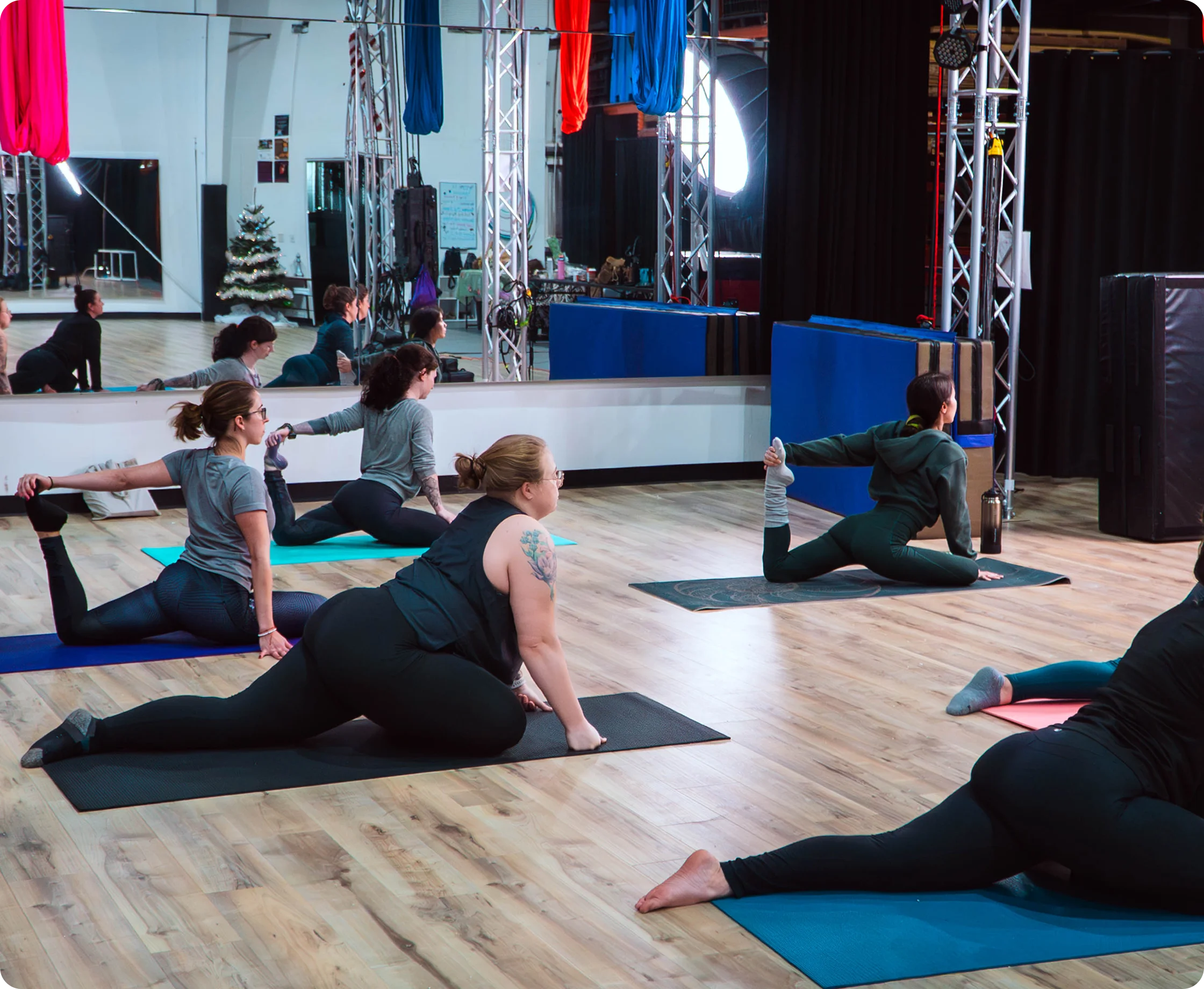Students stretching in studio